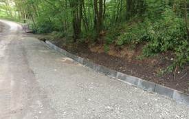 Połom Duży - ułożenie korytek obsypanie kruszywem